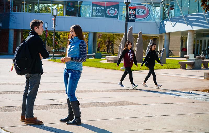 Students talking on the Atwood Mall